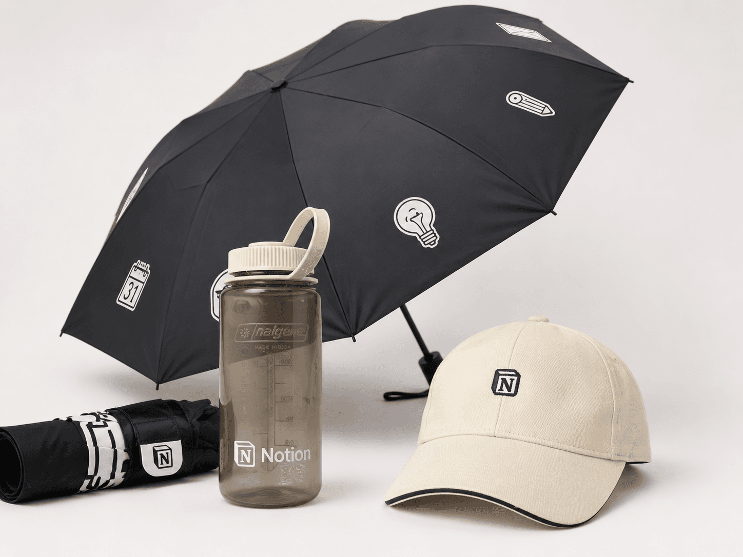 Notion branded cap, water bottle and umbrella