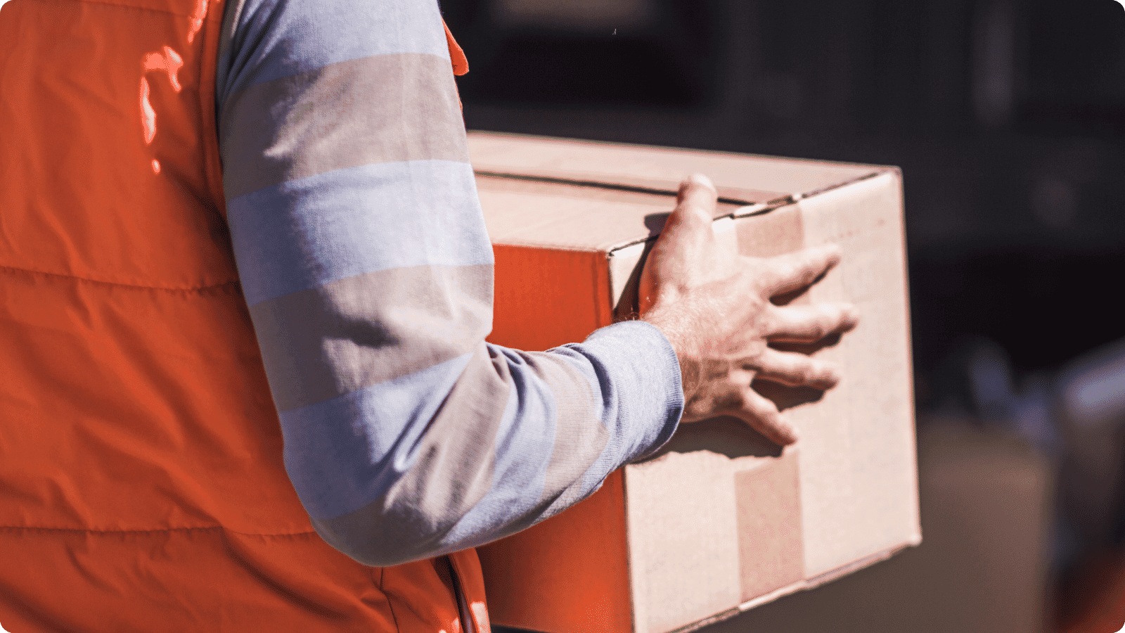 Delivery person handing over package